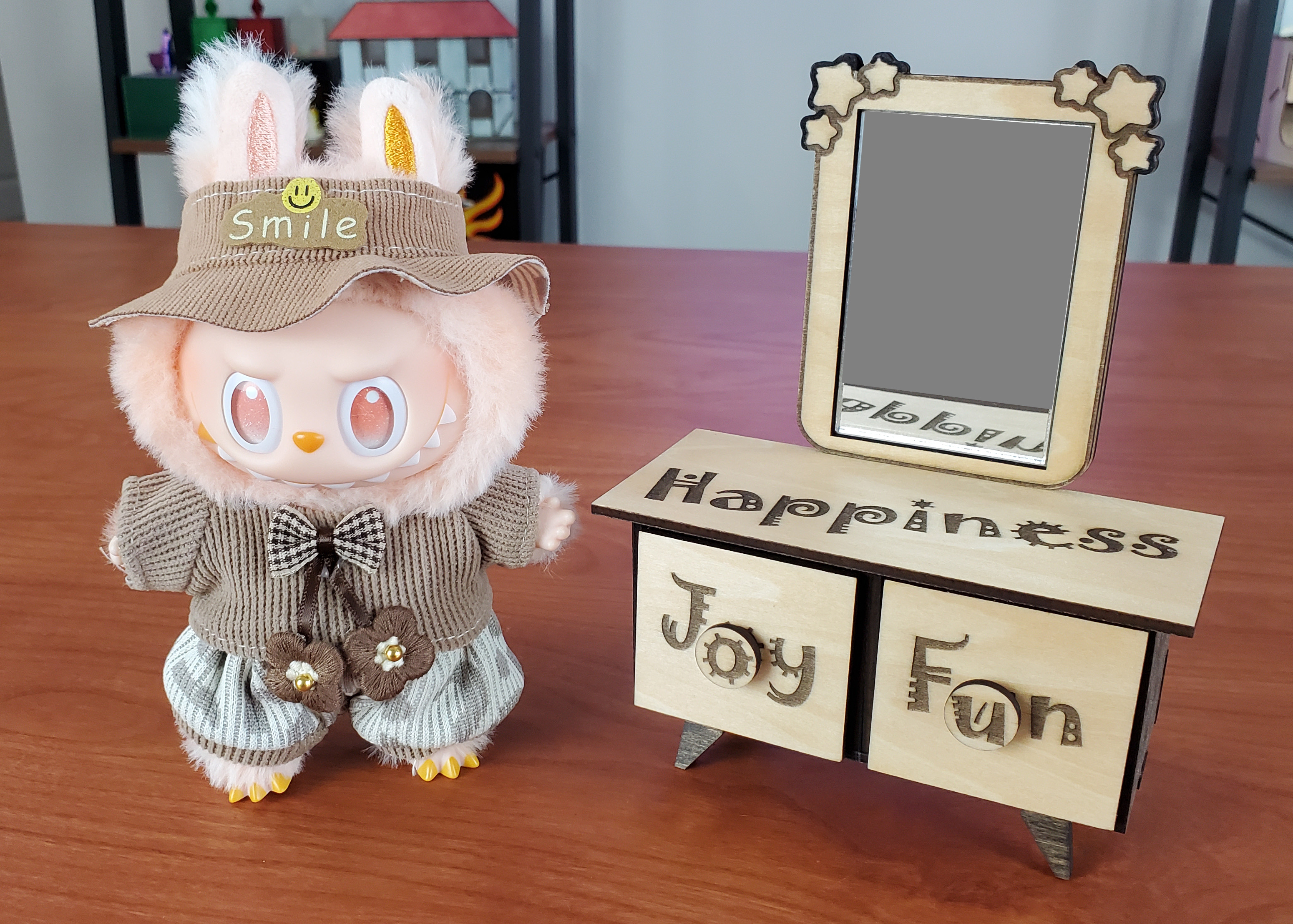 Laser cut candle shades with decorative motifs, lit from inside